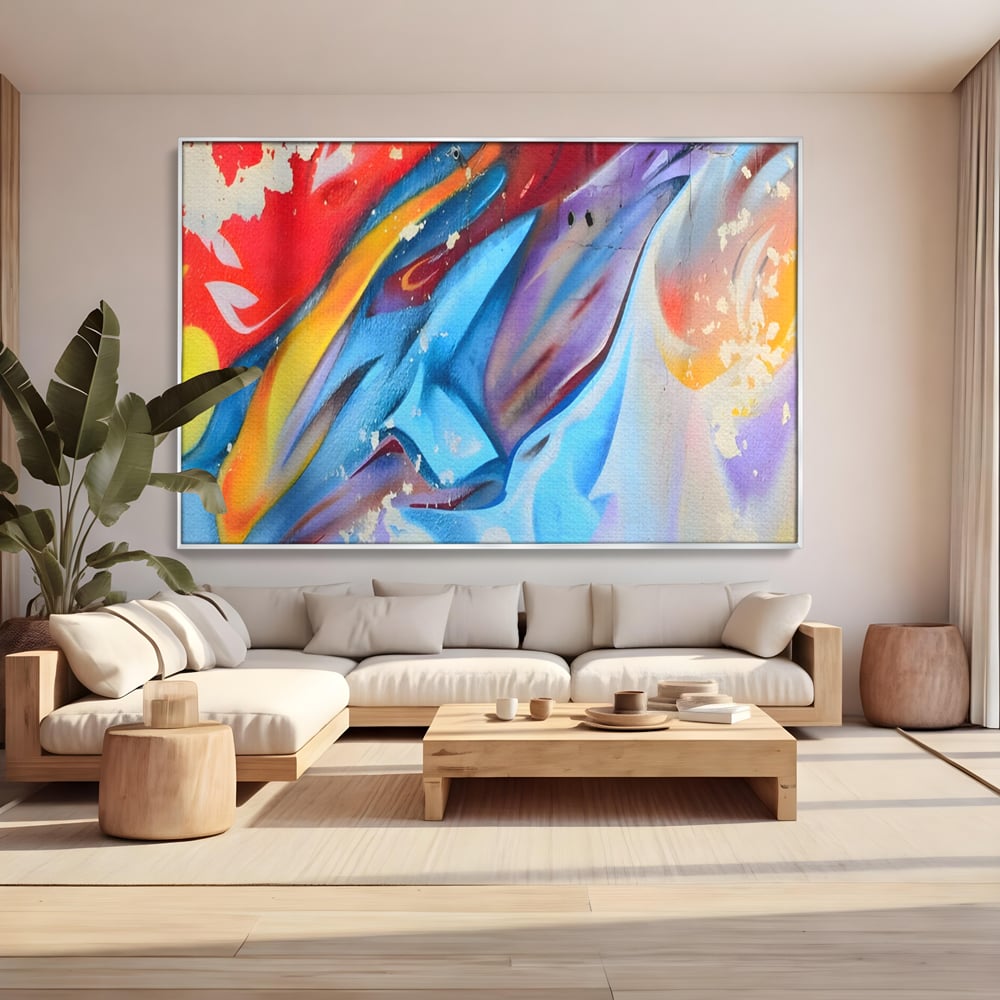 Tablou canvas cu pictura abstracta cu forme dinamice, in rama de aluminiu argintiu, pe perete intr-un living